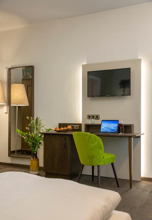 TV a/nebo společenská místnost v ubytování Altstadthotel der Patrizier