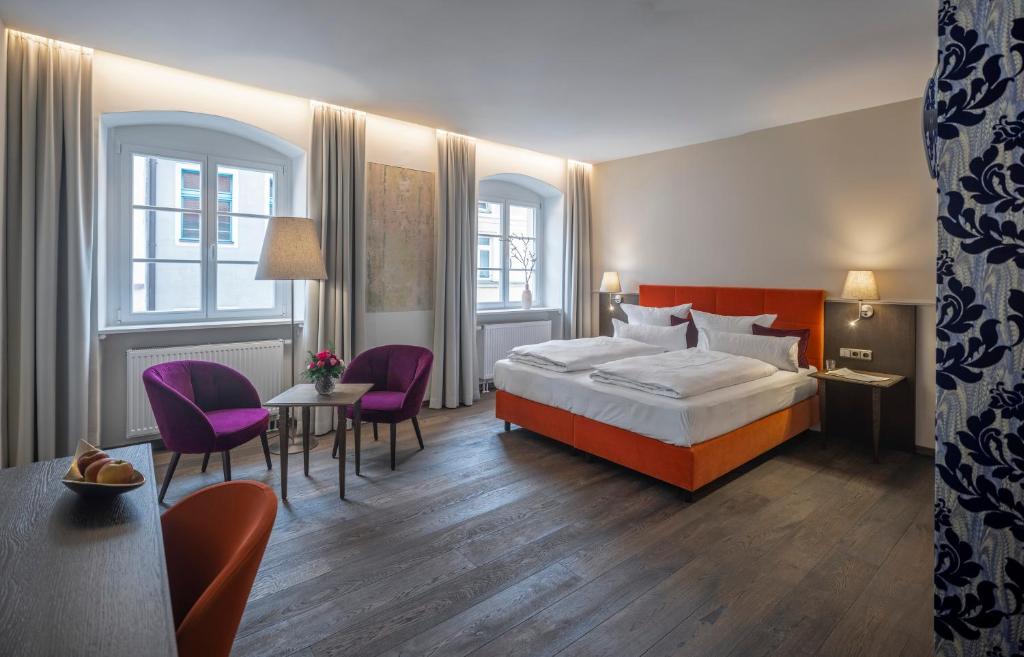 Postel nebo postele na pokoji v ubytování Altstadthotel der Patrizier