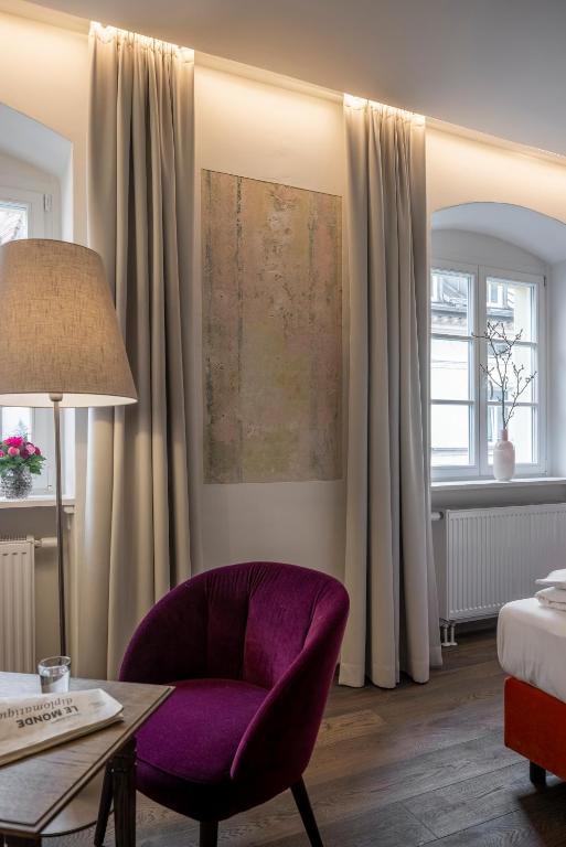 Postel nebo postele na pokoji v ubytování Altstadthotel der Patrizier