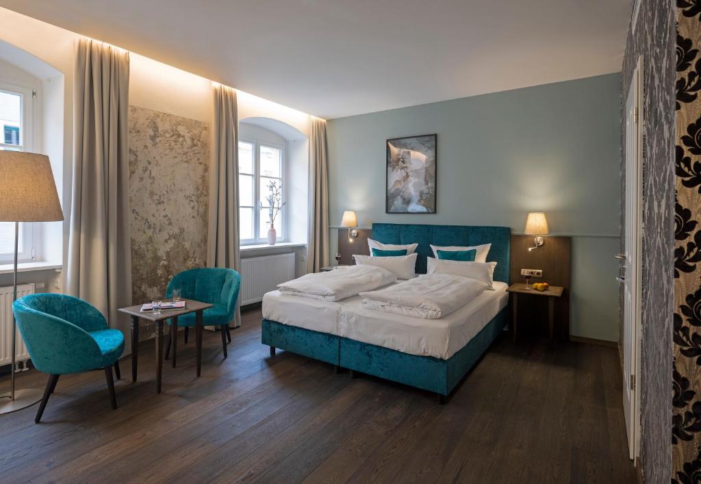 Postel nebo postele na pokoji v ubytování Altstadthotel der Patrizier
