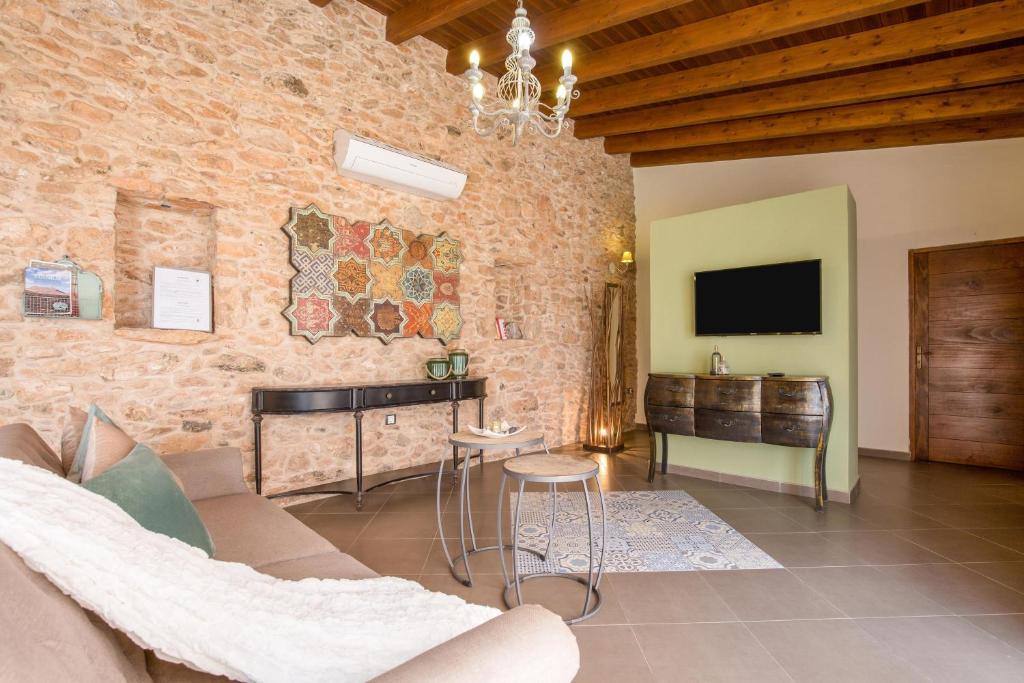 TV a/nebo společenská místnost v ubytování Casa Rural La Morisca