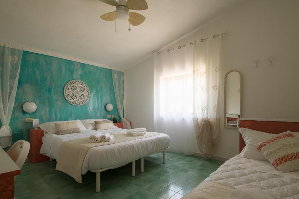 Hotel Punto Verdeにあるベッド