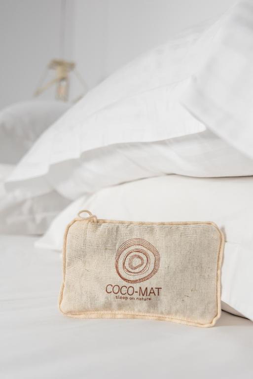 a wallet sitting on top of a pile of papers at Michalakis Seaside Suites in Pollonia