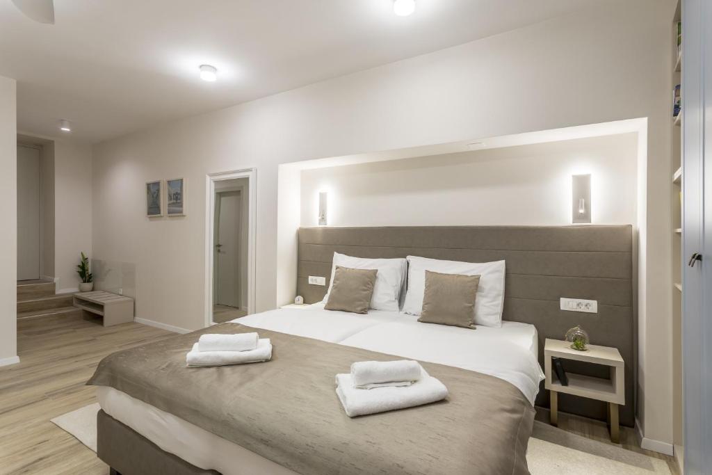 Postel nebo postele na pokoji v ubytování COR ROOMS