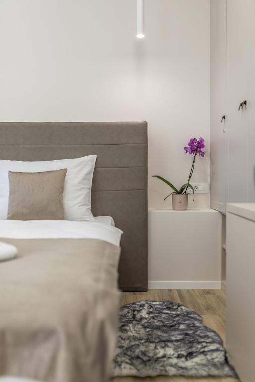 Postel nebo postele na pokoji v ubytování COR ROOMS