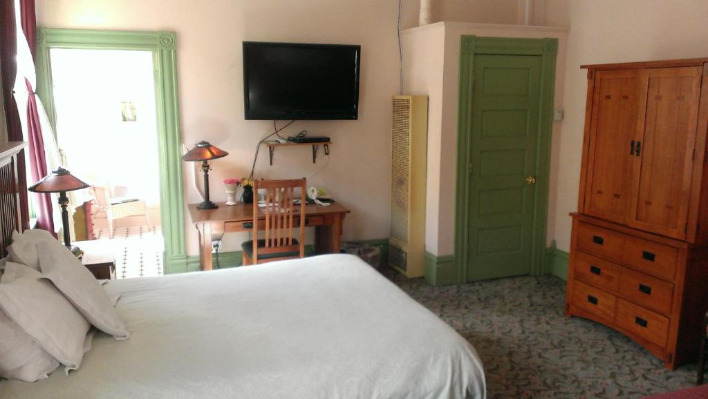 Voodi või voodid majutusasutuse Connor Hotel toas