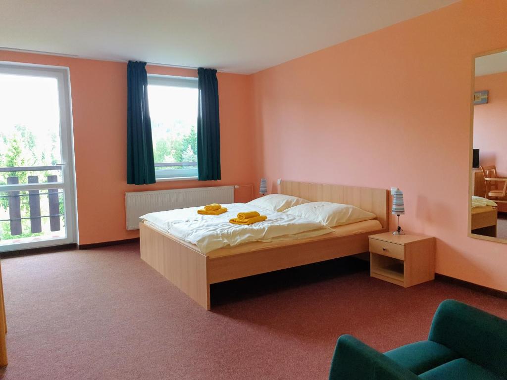 Postel nebo postele na pokoji v ubytování Penzion Lumis