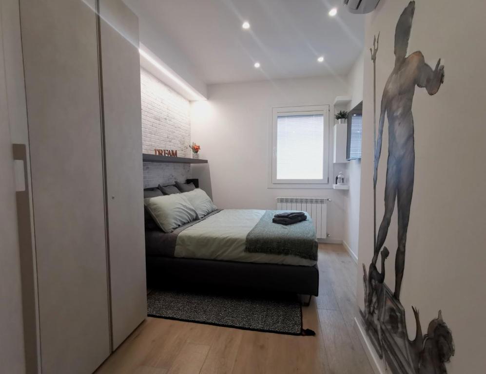 Кровать или кровати в номере 051 Guest House Sant'Orsola Malpighi