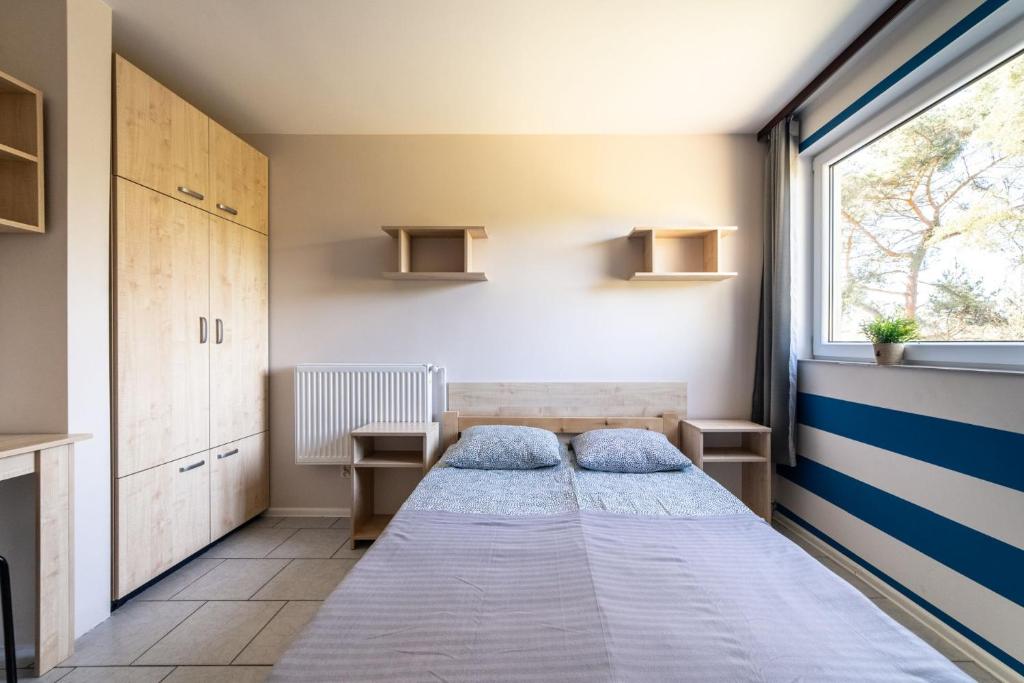 Postel nebo postele na pokoji v ubytování Pokoje Gościnne MAJ - Rozewie
