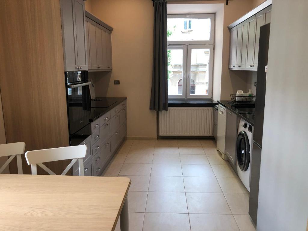 Kuchyň nebo kuchyňský kout v ubytování #VisitLublin Apartments City Center Narutowicza