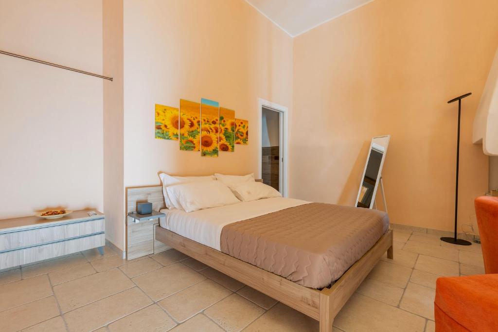Postel nebo postele na pokoji v ubytování Terrae Rooms Rental
