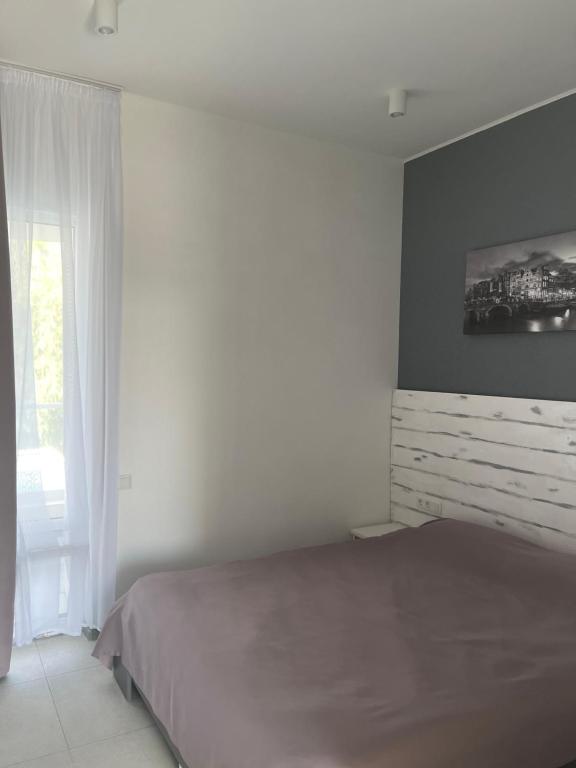 Postel nebo postele na pokoji v ubytování Zigzag
