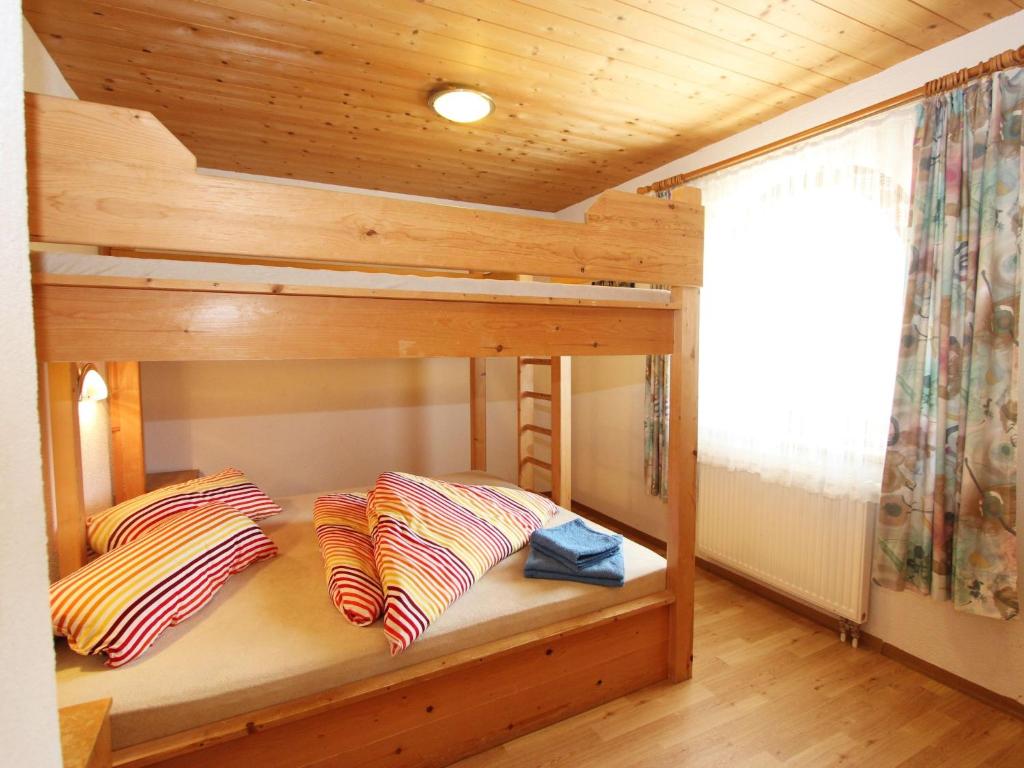 Postel nebo postele na pokoji v ubytování Apartment Zillertalblick by Interhome