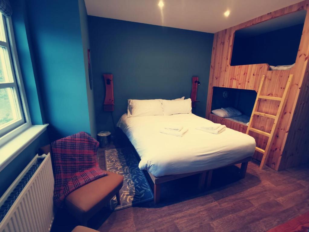 Postel nebo postele na pokoji v ubytování Comrie Croft