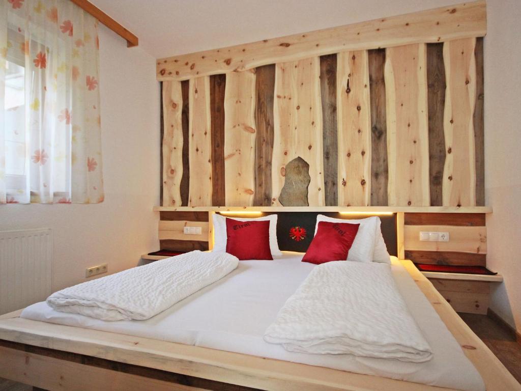 Postel nebo postele na pokoji v ubytování Apartment Haus Sailer by Interhome