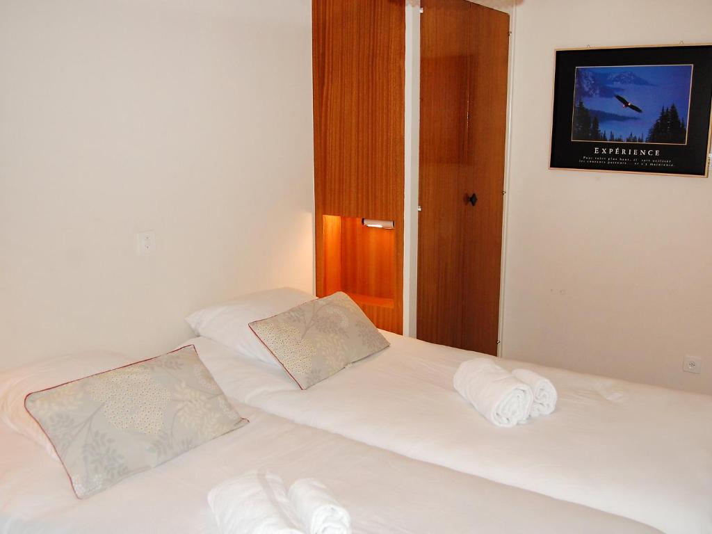 Postel nebo postele na pokoji v ubytování Apartment Nid d'aigle E1 by Interhome