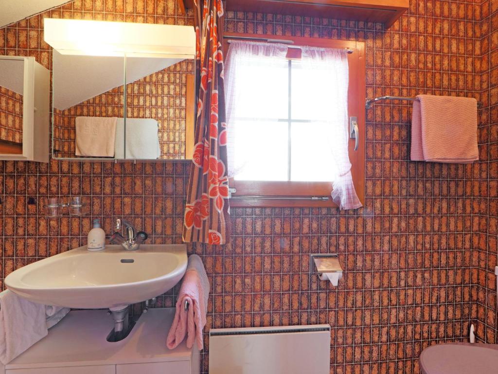 Koupelna v ubytování Apartment Lauberhaus by Interhome