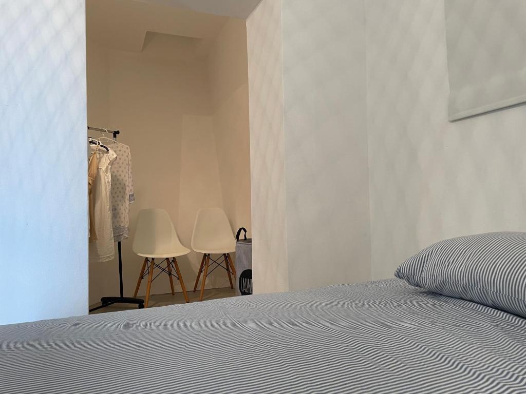 Postel nebo postele na pokoji v ubytování Apartmani Pulić