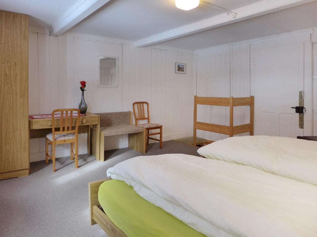 Postel nebo postele na pokoji v ubytování Apartment Grosshorn by Interhome