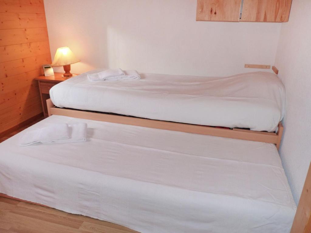 Postel nebo postele na pokoji v ubytování Chalet Escapade by Interhome