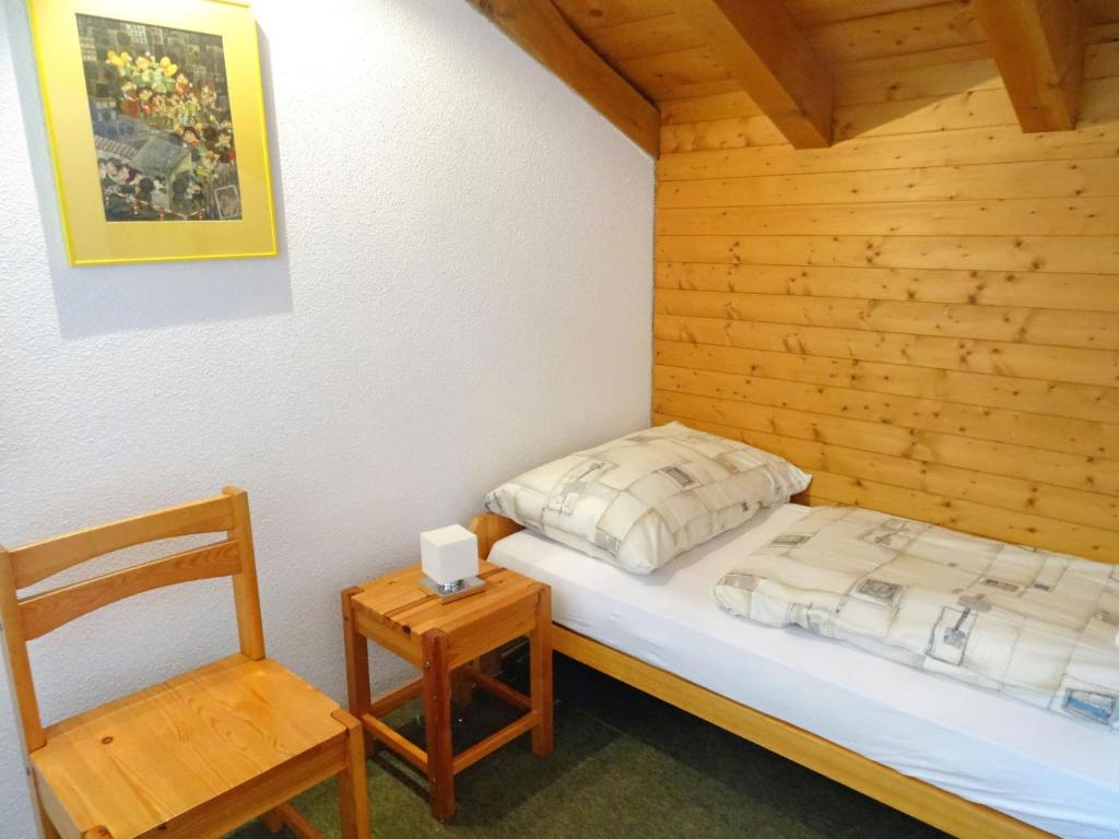 Postel nebo postele na pokoji v ubytování Apartment Aragon T100 by Interhome