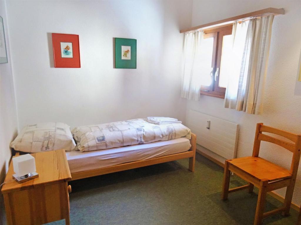 Postel nebo postele na pokoji v ubytování Apartment Aragon T100 by Interhome