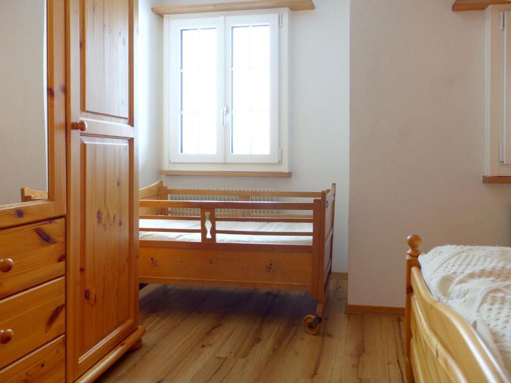 Ένα ή περισσότερα κρεβάτια σε δωμάτιο στο Apartment Chalet Seeberg by Interhome