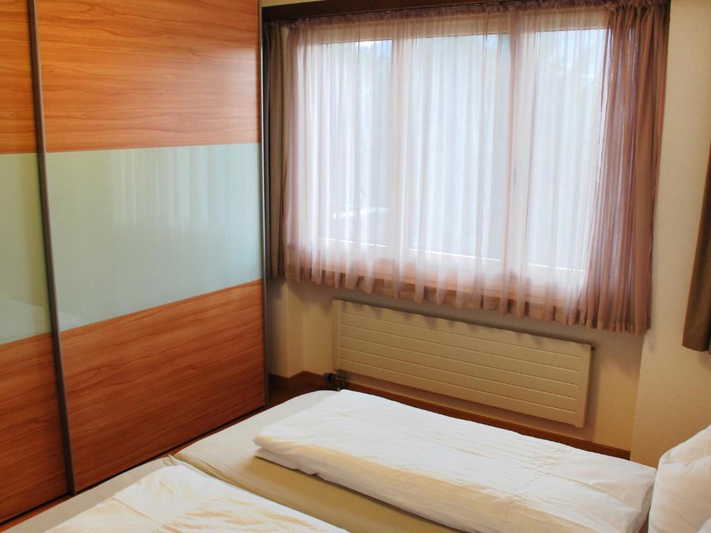 Postel nebo postele na pokoji v ubytování Apartment Valetta Sura by Interhome