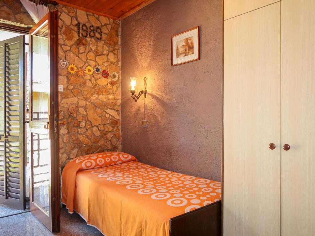Postel nebo postele na pokoji v ubytování Apartment Visnja-2 by Interhome