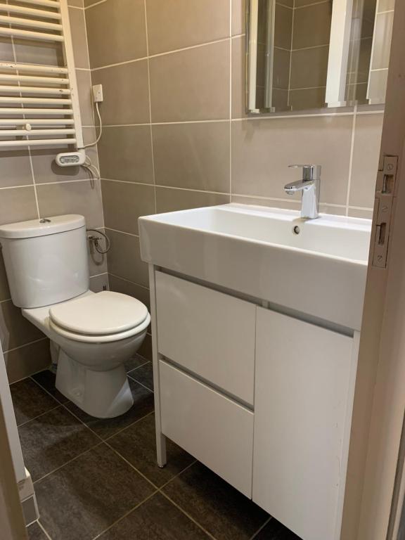 Koupelna v ubytování Hotel Azur