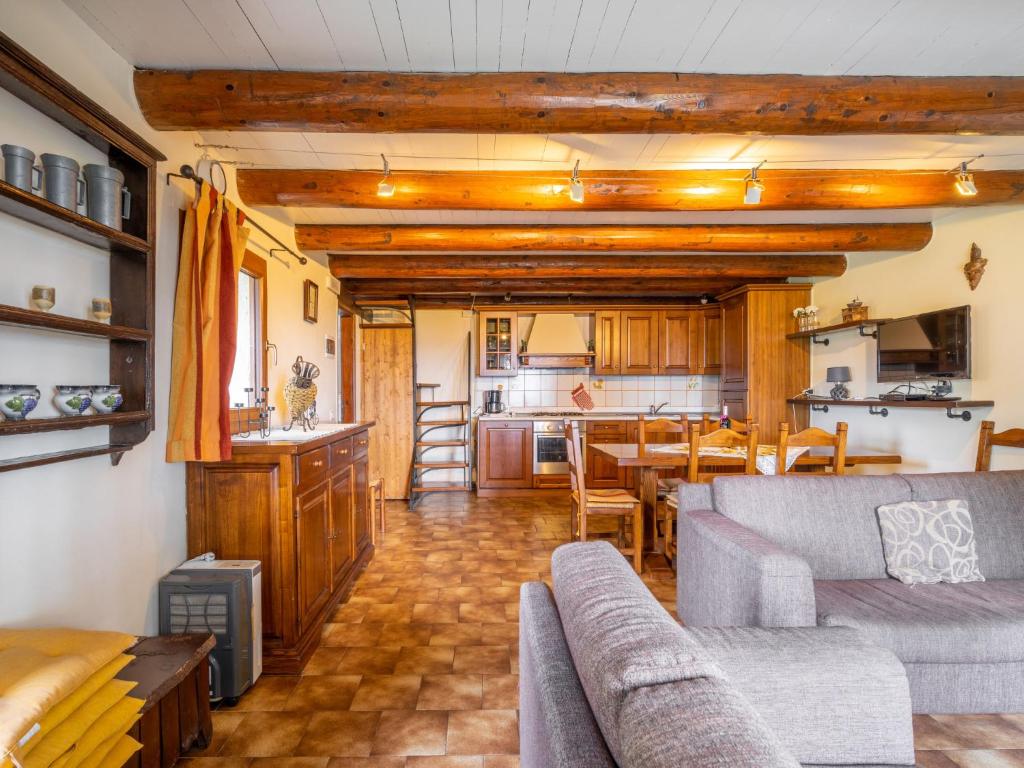 Część wypoczynkowa w obiekcie Holiday Home Baita Nini by Interhome
