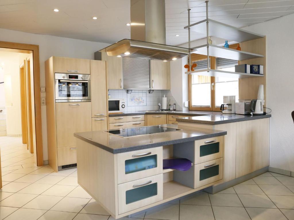 A kitchen or kitchenette at Holiday Home Heidi by Interhome