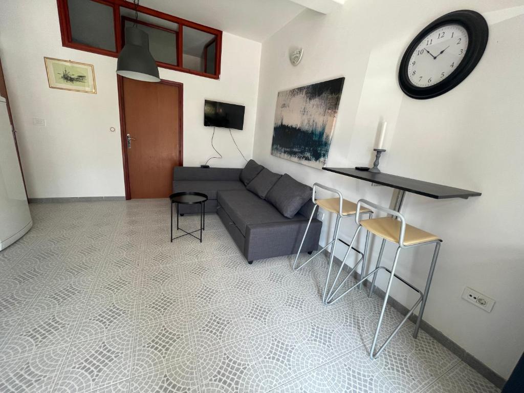 TV a/nebo společenská místnost v ubytování Apartmani Pulić