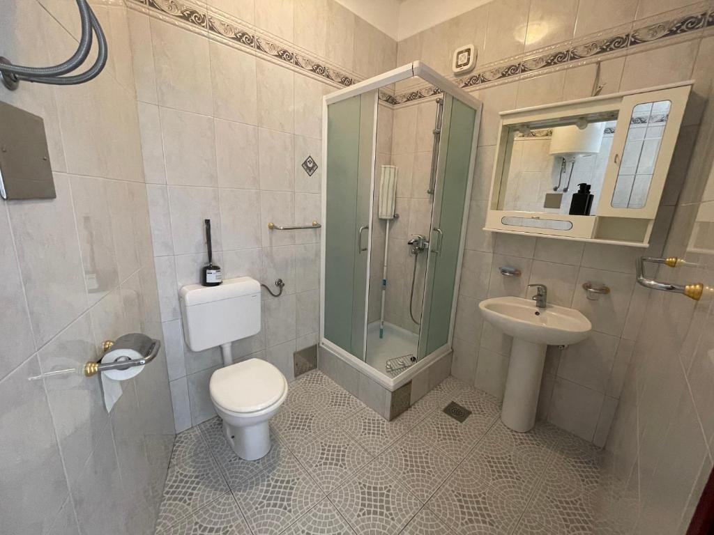 Koupelna v ubytování Apartmani Pulić