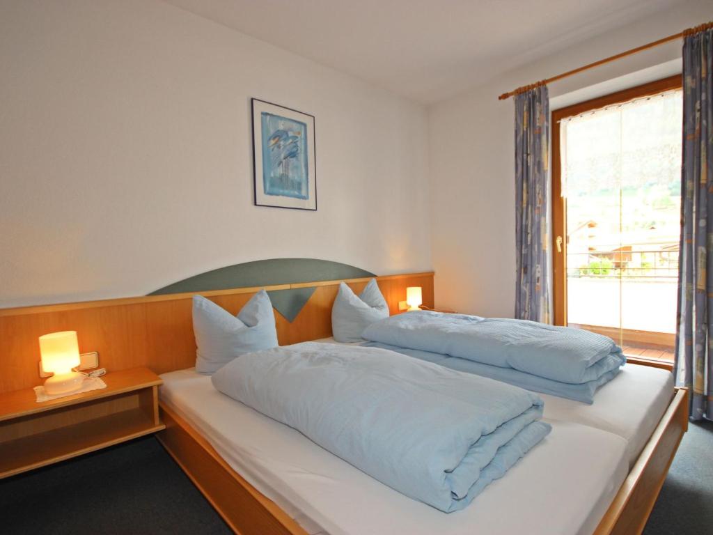 Posteľ alebo postele v izbe v ubytovaní Apartment Handle-3 by Interhome