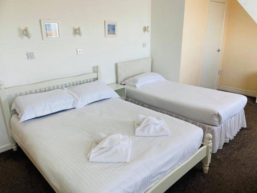 Postel nebo postele na pokoji v ubytování Seawold Guest House