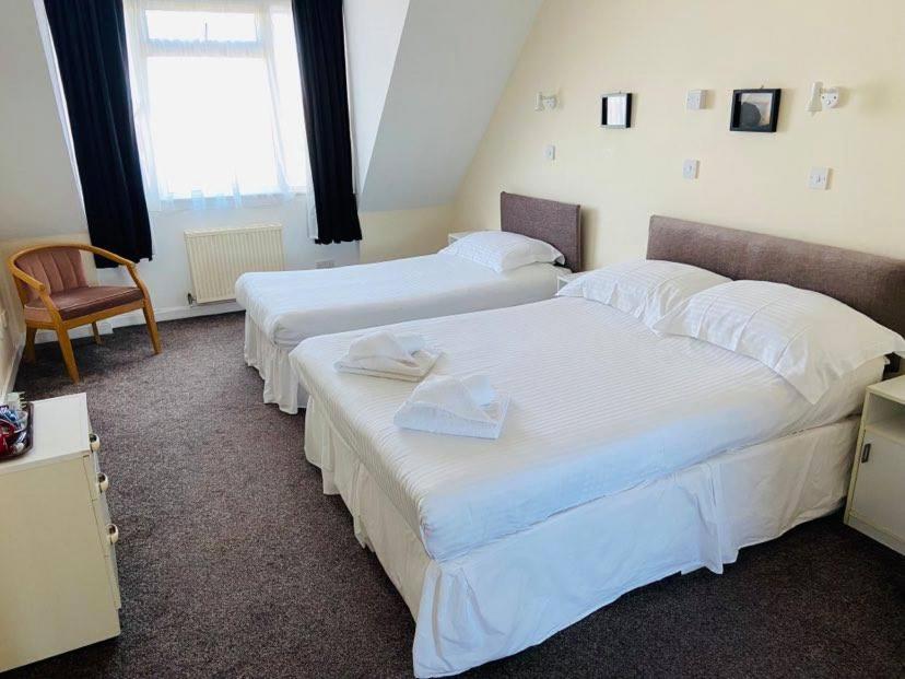 Postel nebo postele na pokoji v ubytování Seawold Guest House