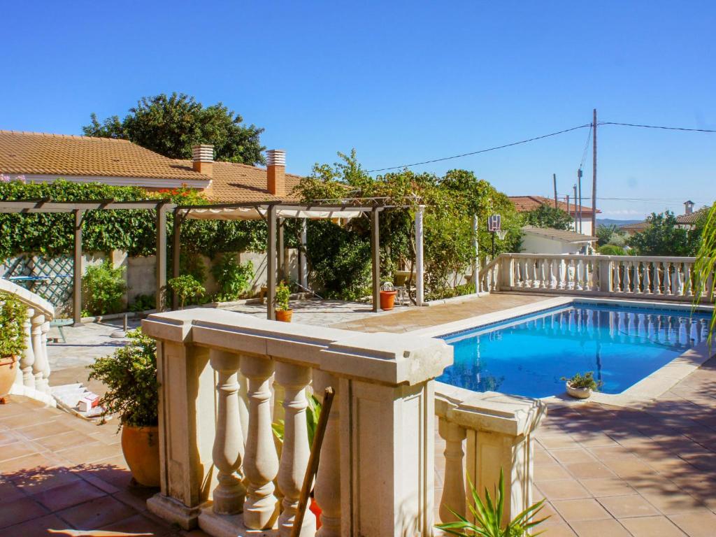 The swimming pool at or close to Holiday Home Papagayo by Interhome