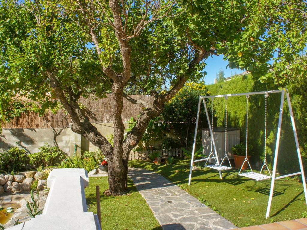 A garden outside Holiday Home Papagayo by Interhome