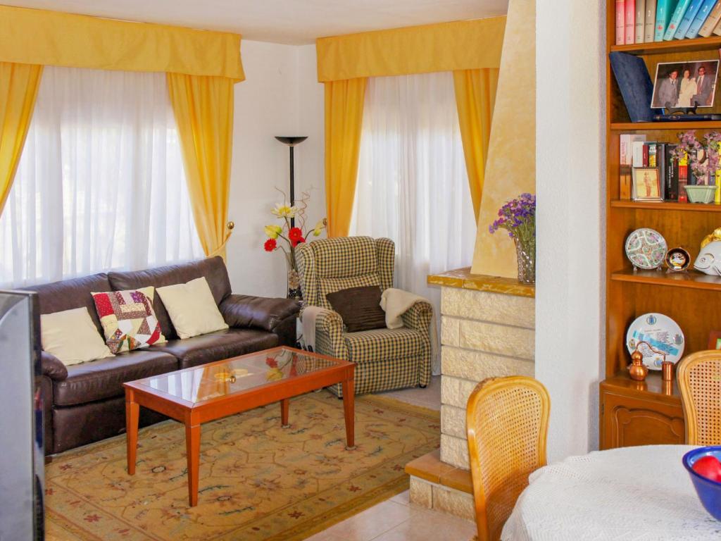 A seating area at Holiday Home Papagayo by Interhome