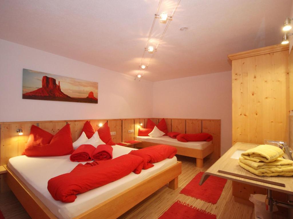 Posteľ alebo postele v izbe v ubytovaní Apartment Evi by Interhome