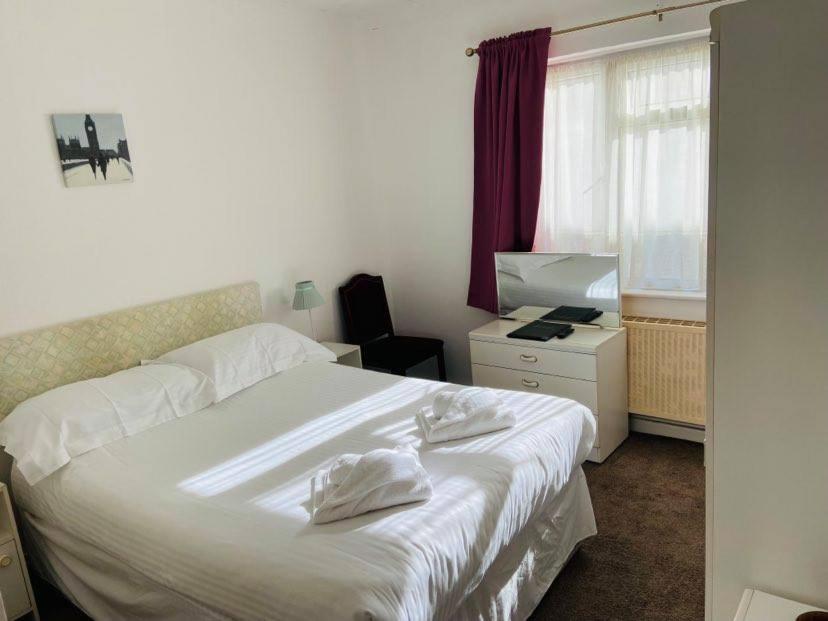 Postel nebo postele na pokoji v ubytování Seawold Guest House