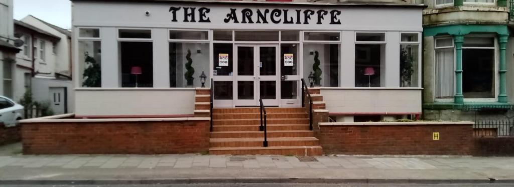 a building with the entrance to a building at Arncliffe Lodge Hotel in Blackpool