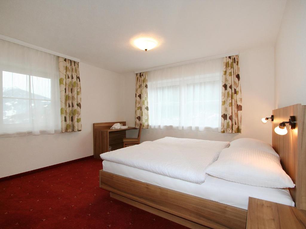 Posteľ alebo postele v izbe v ubytovaní Apartment Pfeifer-2 by Interhome