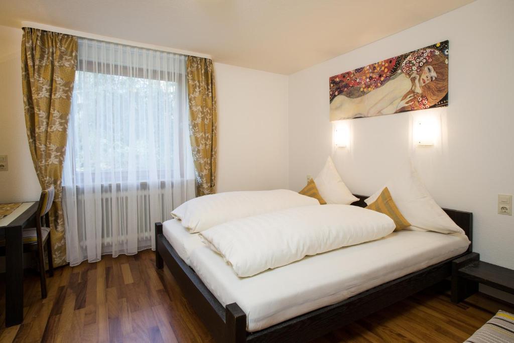 Postel nebo postele na pokoji v ubytování Ferienresort am Mattenweg