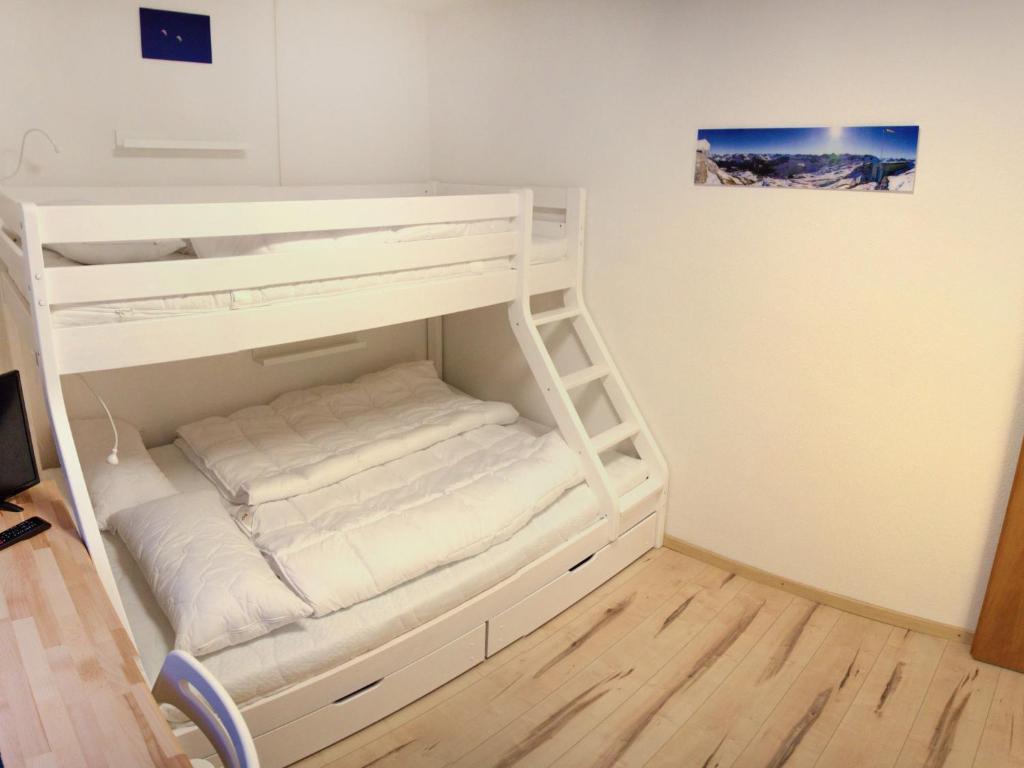 Postel nebo postele na pokoji v ubytování Apartment Promenade - Utoring-11 by Interhome
