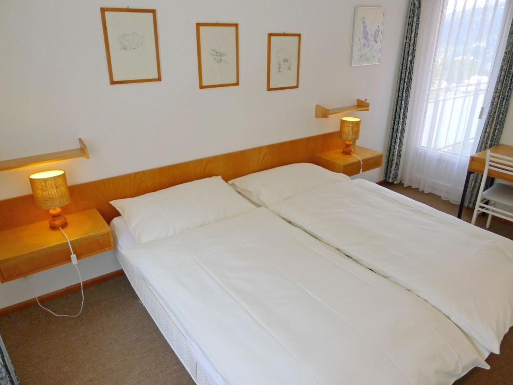 Postel nebo postele na pokoji v ubytování Apartment Promenade - Utoring-74 by Interhome