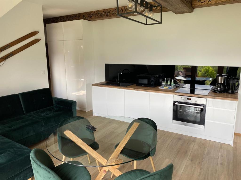 Kuchyňa alebo kuchynka v ubytovaní Apartamenty Butorowy