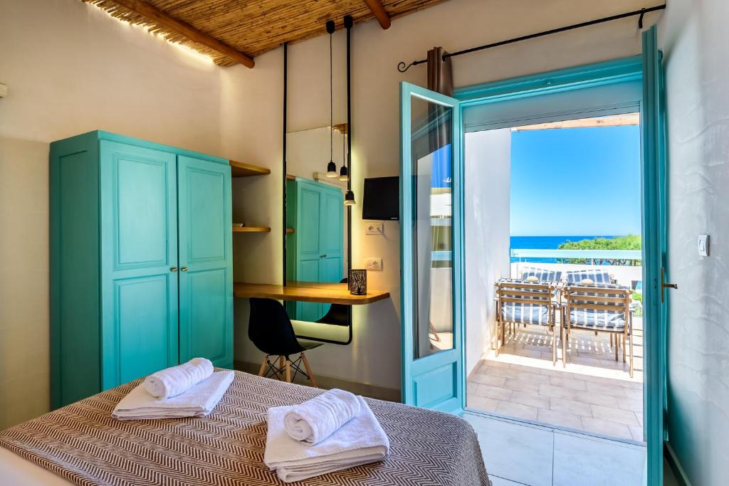 Postel nebo postele na pokoji v ubytování Ilias Apartments