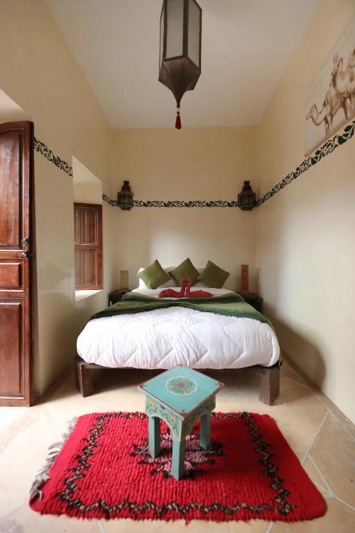 Postel nebo postele na pokoji v ubytování Riad Sidi Mimoune & Spa